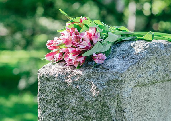 headstone with flowers