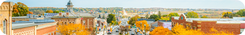 An aerial view of a historic downtown streetscape in the autumn.