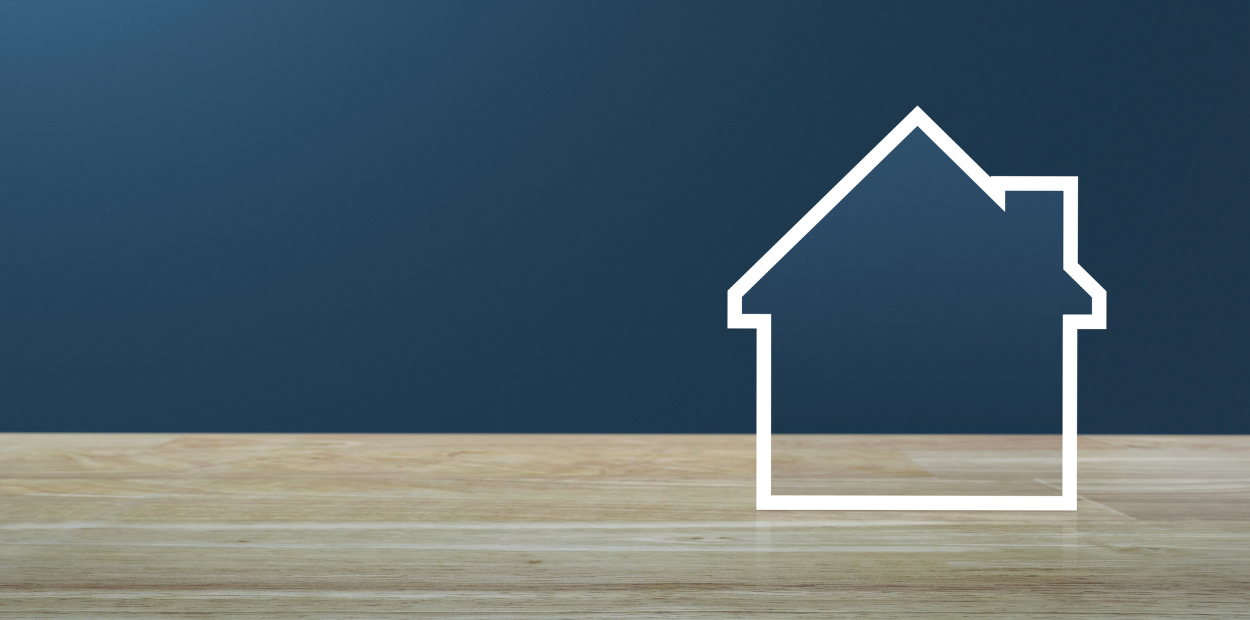 A white outline of a house against a blue background