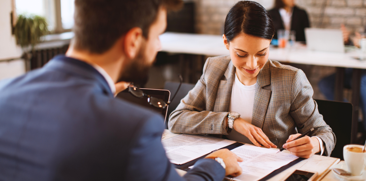 A woman looking at a paper