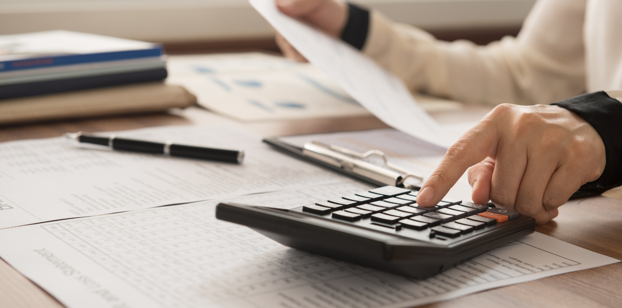 A person using a calculator