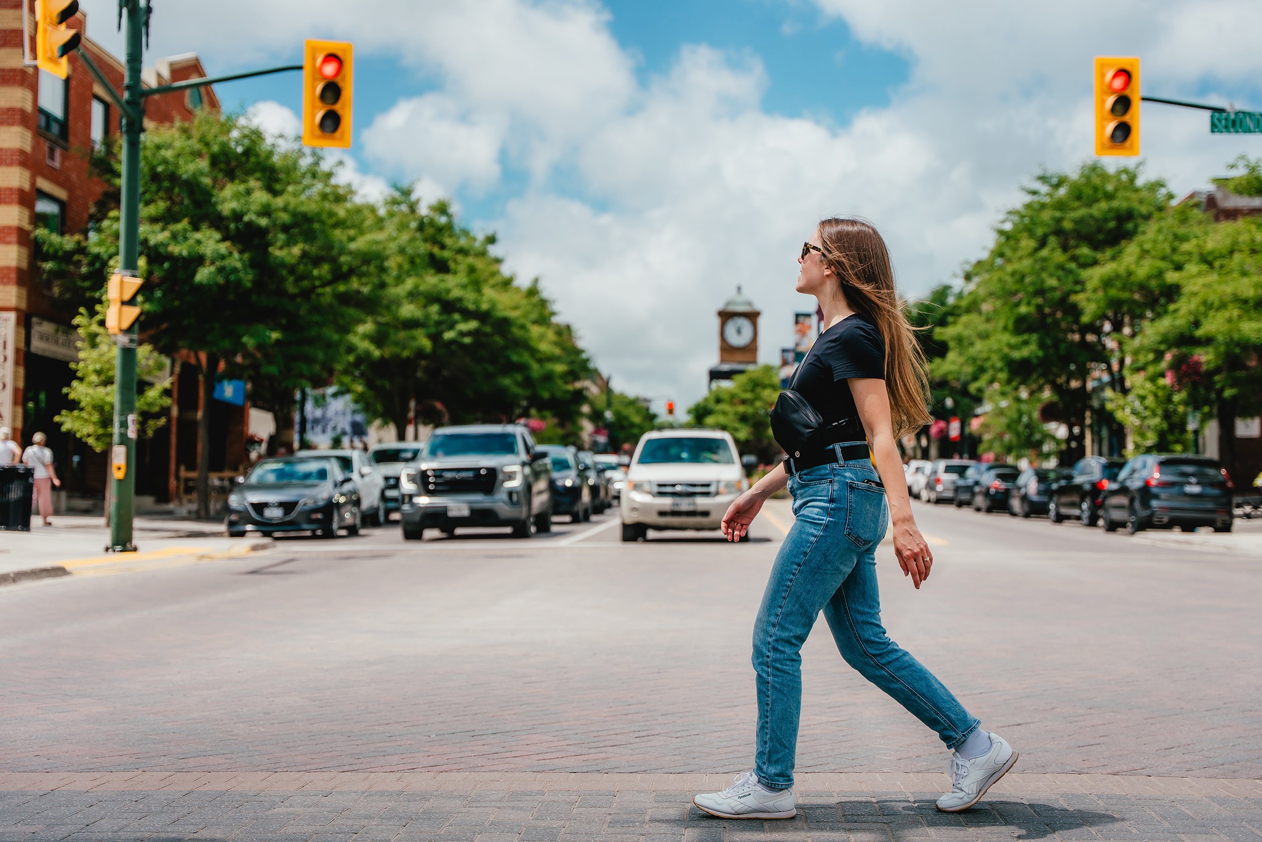 A person crossing a road at an intersection