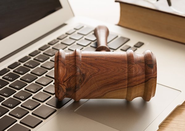 gavel on computer keyboard