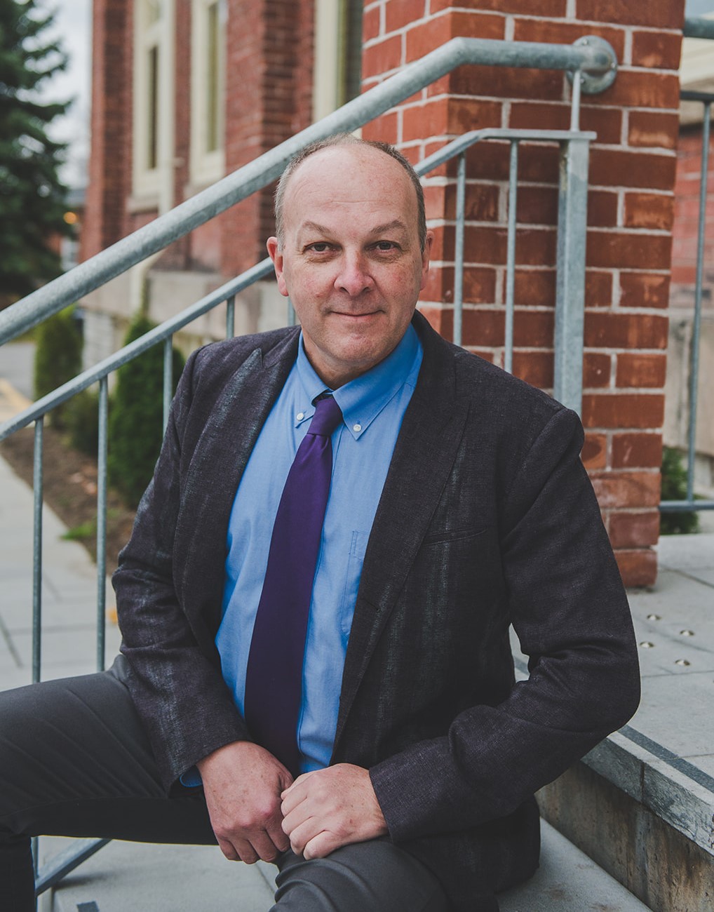 David Smith sitting on steps