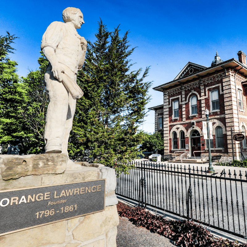 Image of the Orange Lawrence statue standing in front of the Town Hall