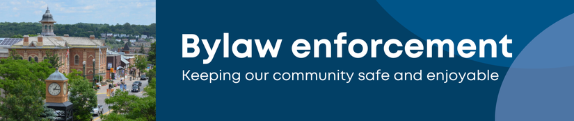 A web banner for Bylaw enforcement. A picture of a heritage building is included on the left side of the banner.