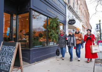 Shopping in downtown Orangeville A family walking by storefronts